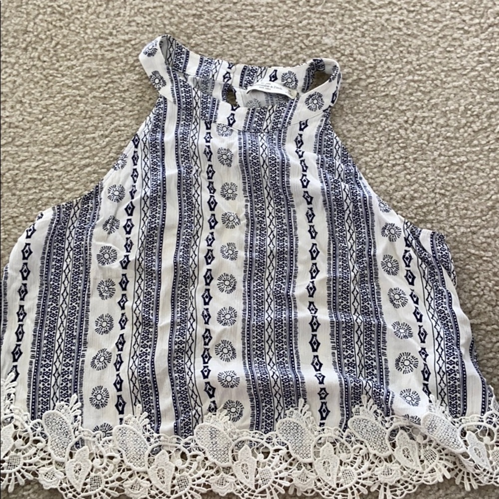 Top with detail on the bottom